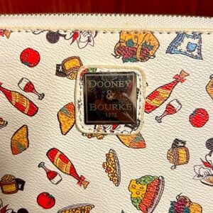 Disney Dooney and Bourke full zip wallet/wristlet